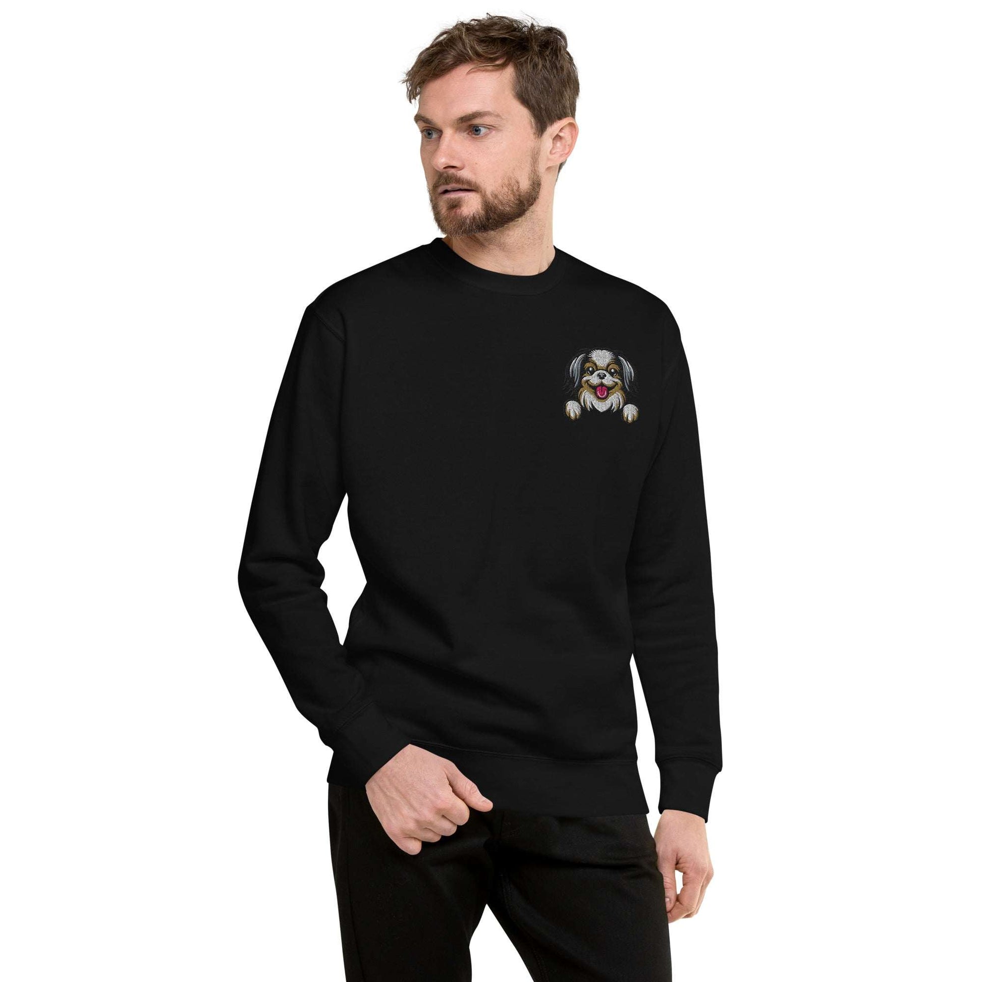 Unisex black premium sweatshirt with detailed Japanese Chin dog embroidery on chest, soft fabric and classic crew neck design.