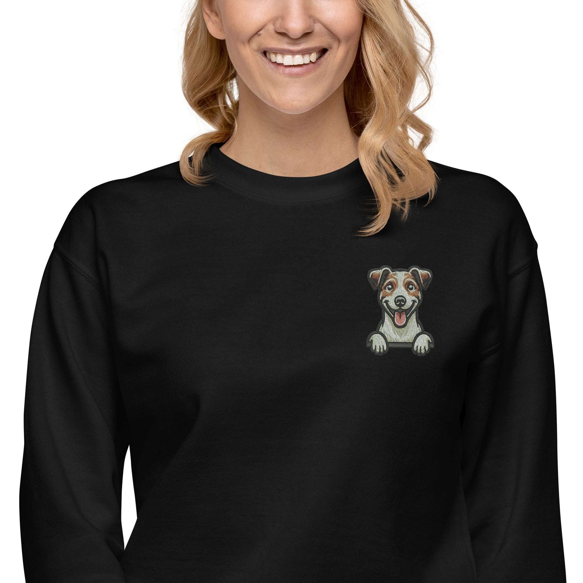 woman wearing black Jack Russell sweatshirt with embroidered playful dog design on chest