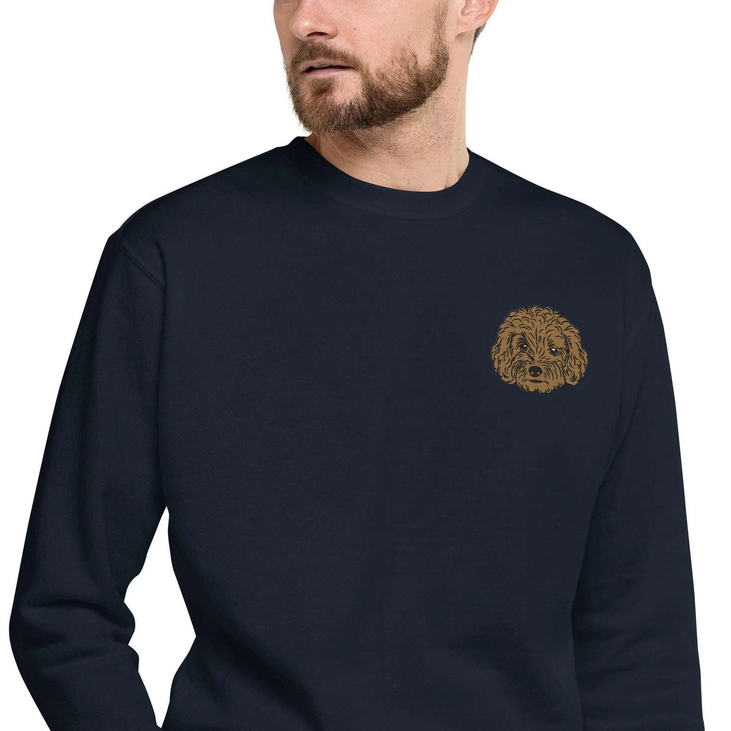 Unisex premium sweatshirt with detailed Poodle embroidery on navy fabric, featuring a ribbed crew neck and soft fleece interior