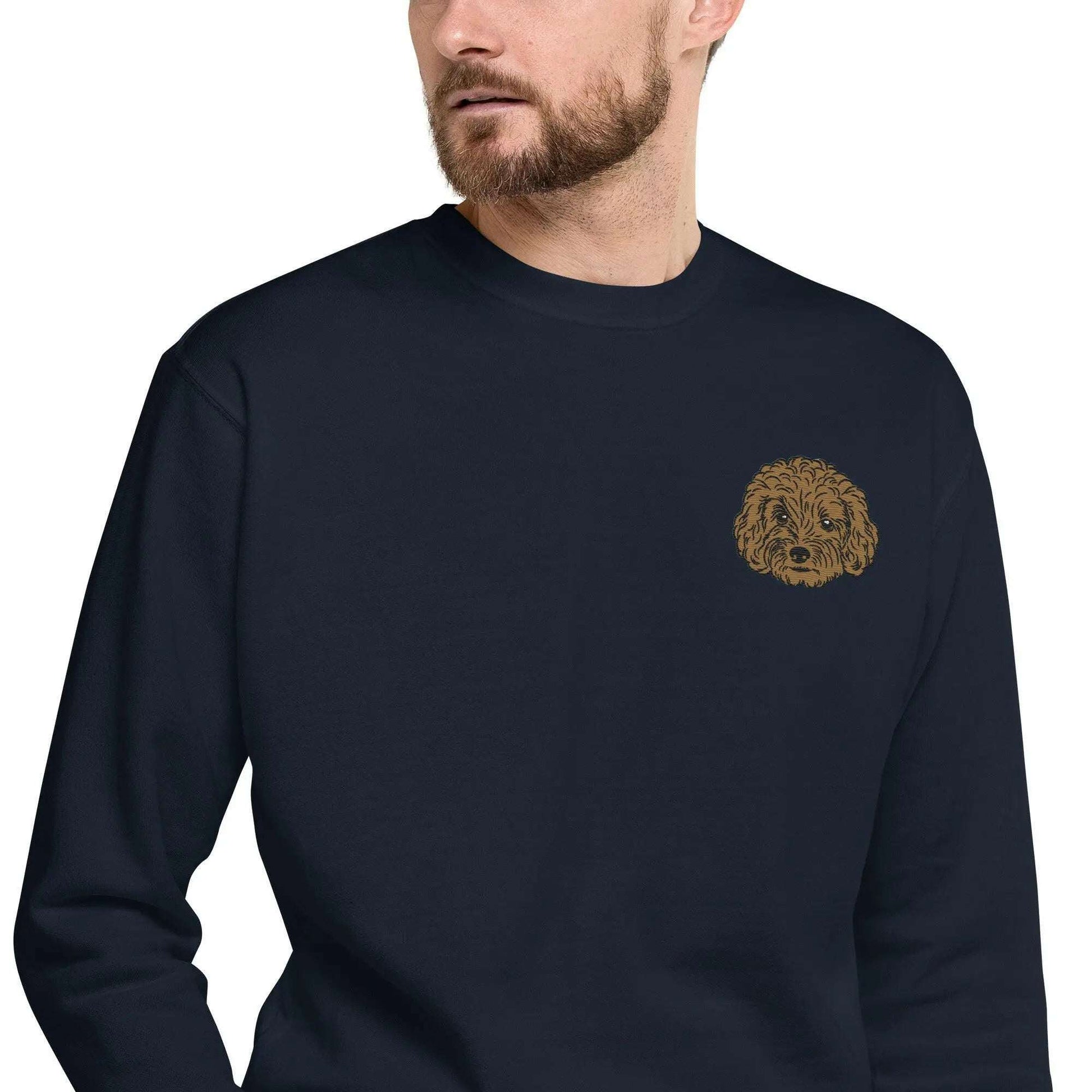 Unisex premium sweatshirt with detailed Poodle embroidery on navy fabric, featuring a ribbed crew neck and soft fleece interior