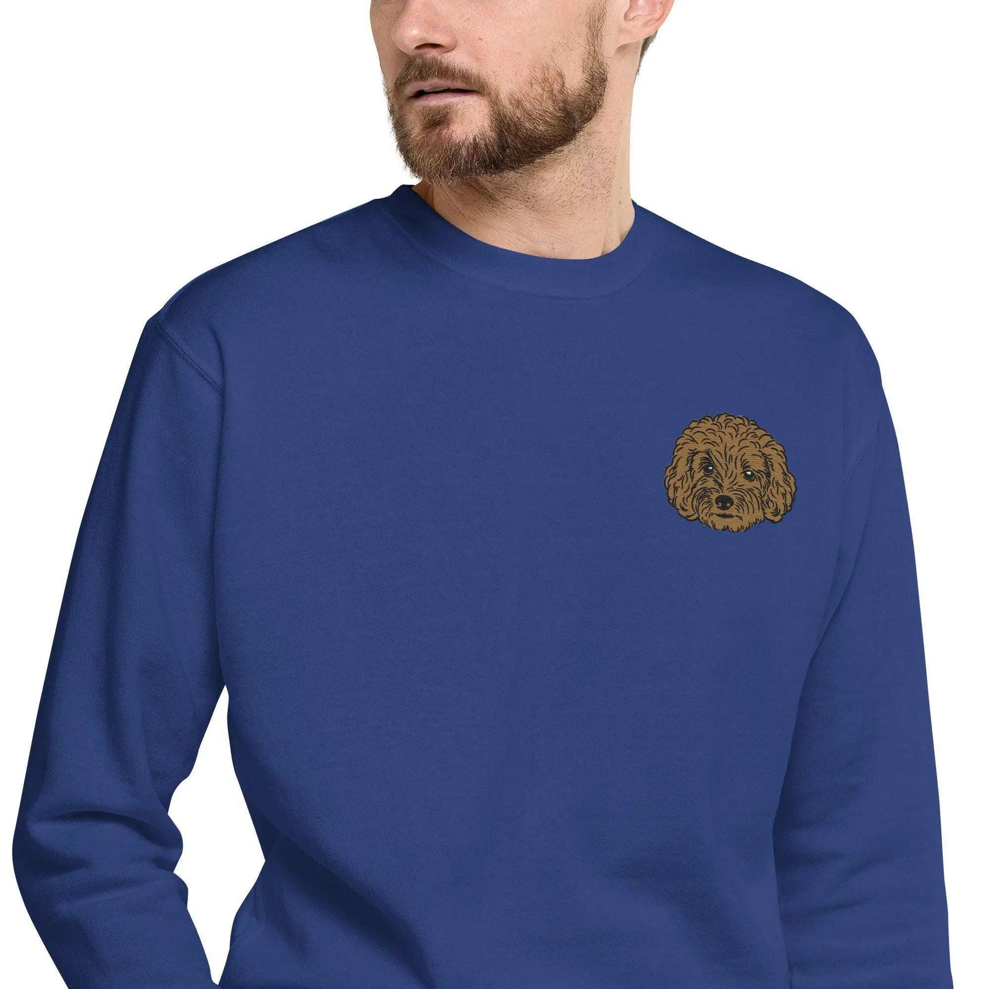 Unisex navy sweatshirt with intricate brown poodle embroidery on chest, premium soft fabric, cozy fleece interior, and classic crew neck design.