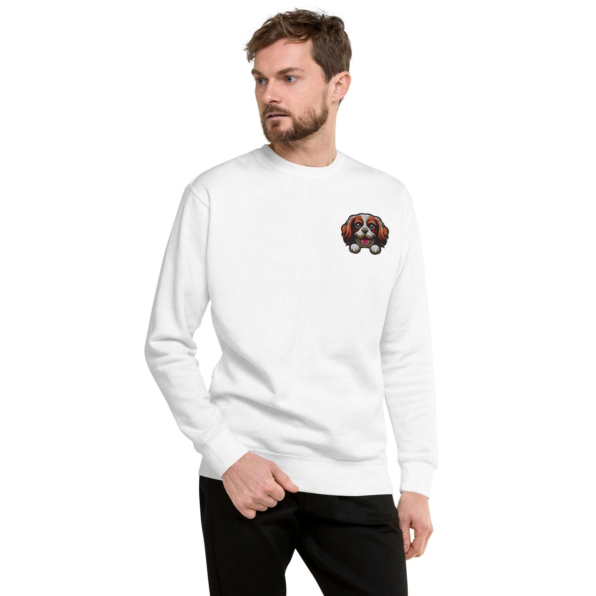 Unisex white sweatshirt with embroidered Cavalier King Charles Spaniel dog face on chest, premium soft fabric, classic fit.