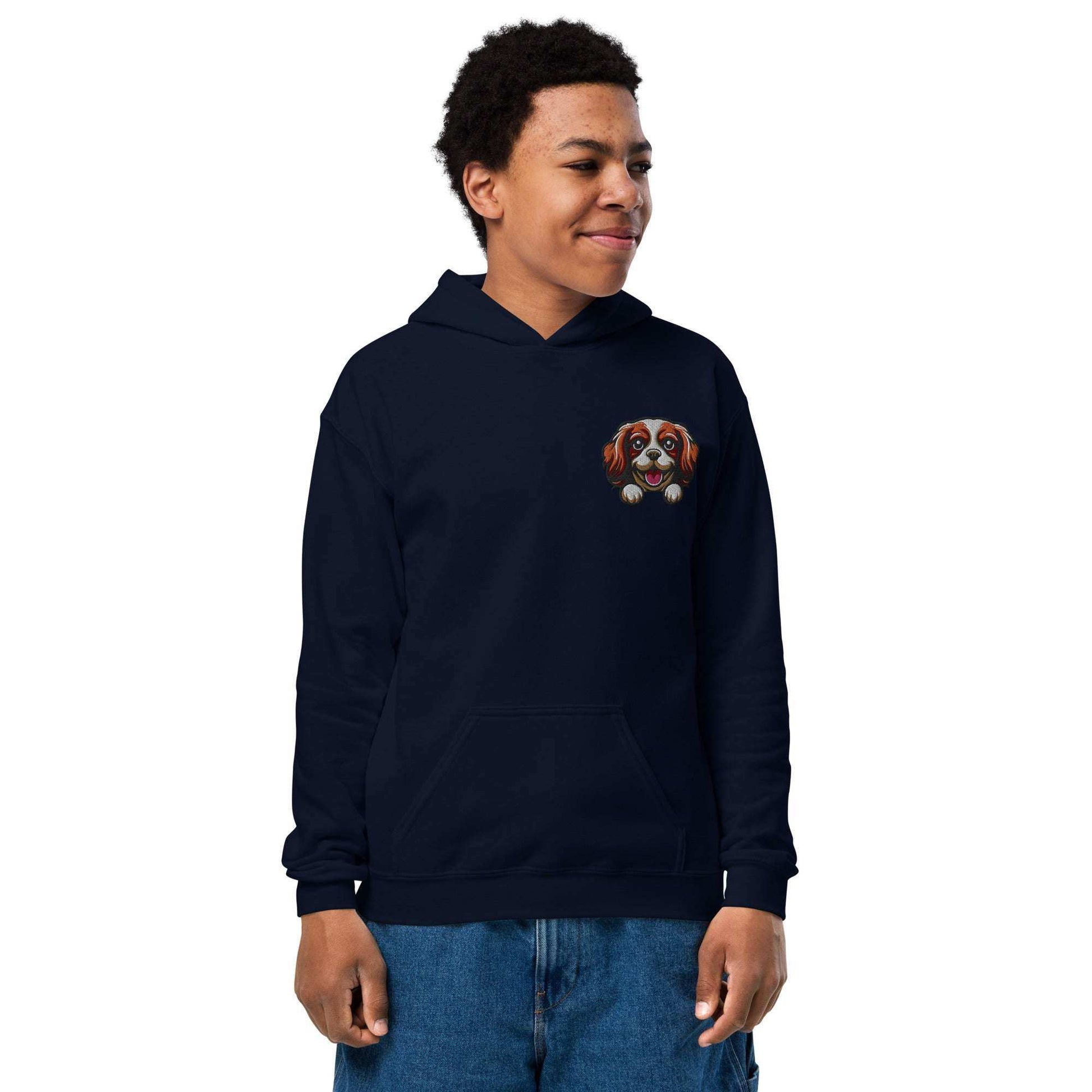 Youth unisex navy hoodie with embroidered Cavalier King Charles Spaniel dog face on chest