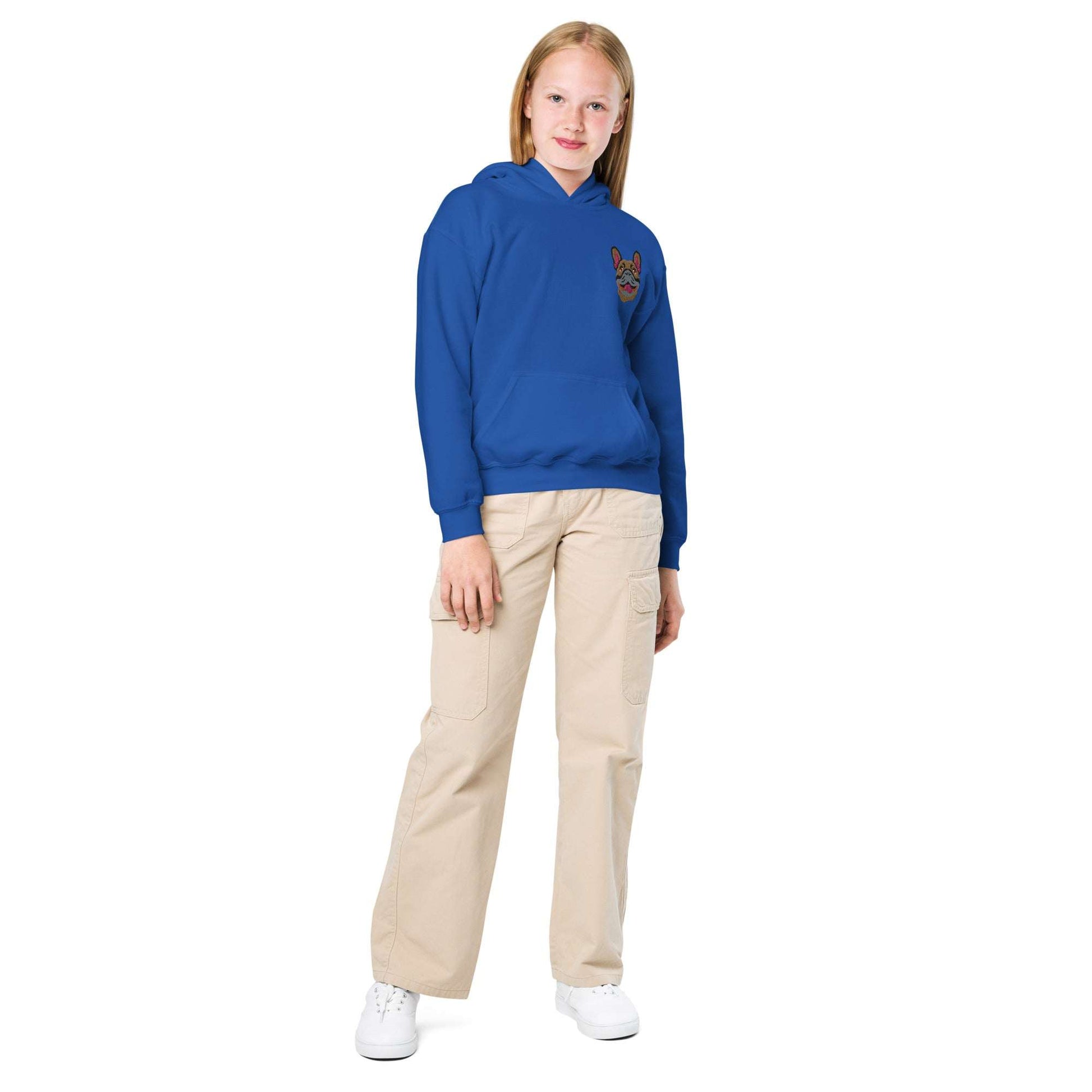 Youth wearing blue Frenchie dog embroidered premium unisex hoodie with beige pants and white sneakers
