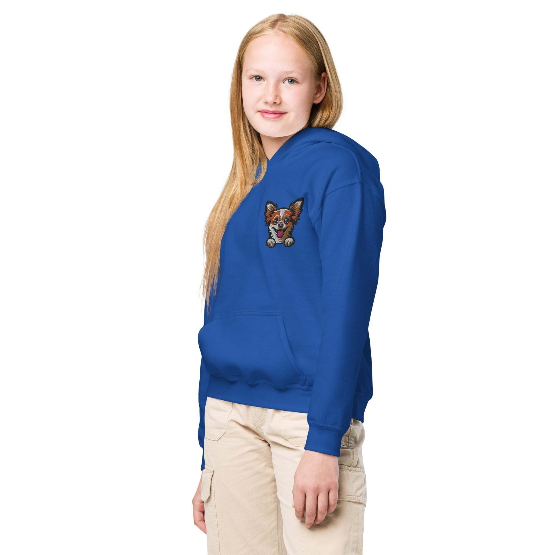 Youth wearing blue premium hoodie with detailed Long Hair Chihuahua embroidery on chest and front pouch pocket